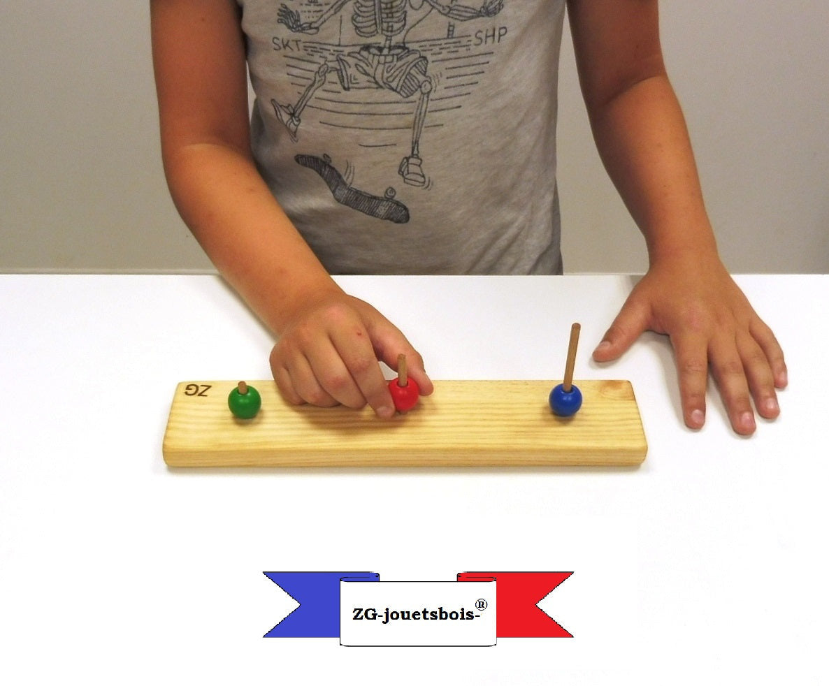 TOLDX test tour londres drexel empilage trois boules rouge vert bleu matériel bois zg-jouetsbois-®