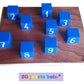 vus dessus bloc corsi planche marron 9 cubes bleus numérotés fabrication française 100% artisanale marque landaise ZG-jouetsbois-